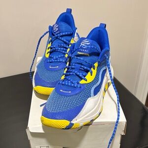 Under Armour Curry Men’s size 10.5 Blue and Yellow Sneakers